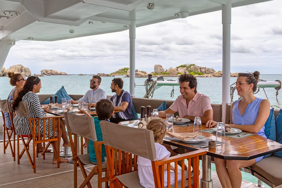 Friends relaxing together on a private yacht charter