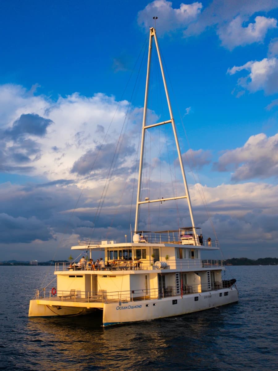 Guests aboard a Sail Lanka sunset cruise off the Sri Lankan coast