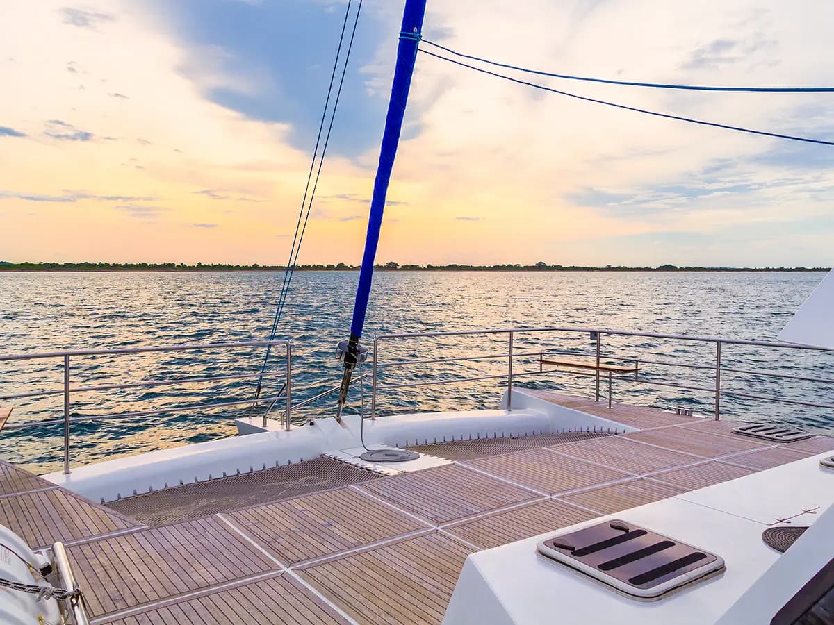 The Ocean Diamond at anchor in a sheltered Sri Lankan bay at sunset